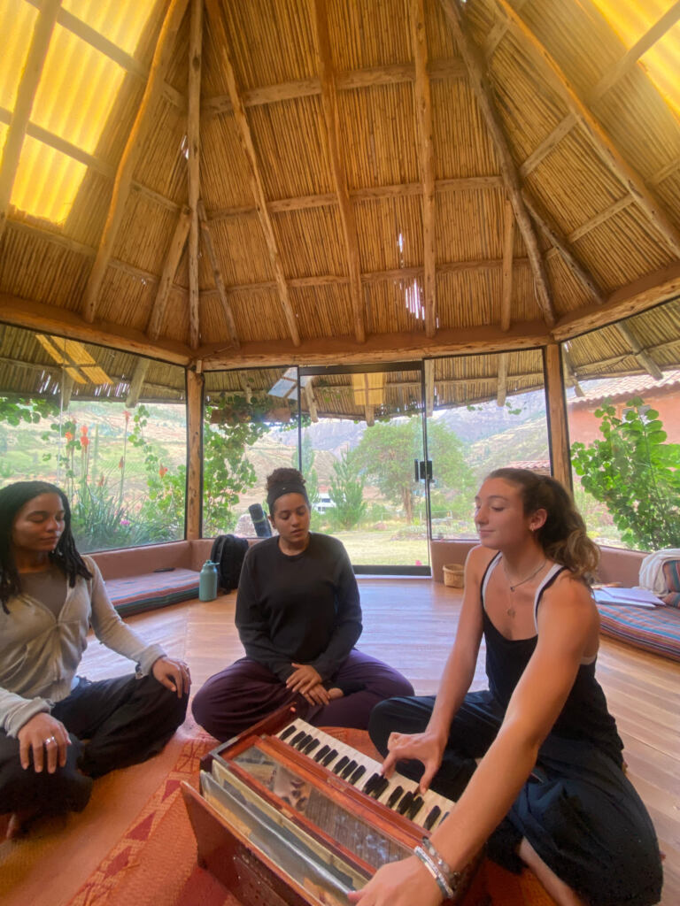 Shyam leading harmonium and devotional music practice